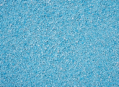 stock-photo-pattern-blue-urea-fertiliser-can-use-for-background-447307228.jpg