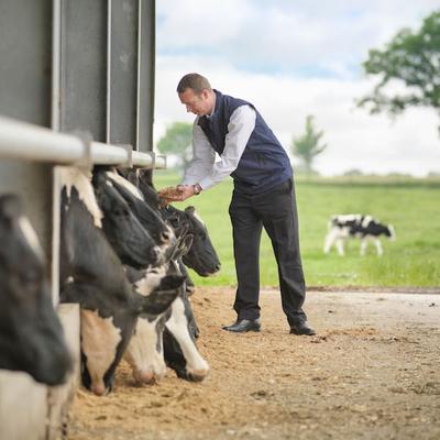 FAR man on farm at clamp-ps